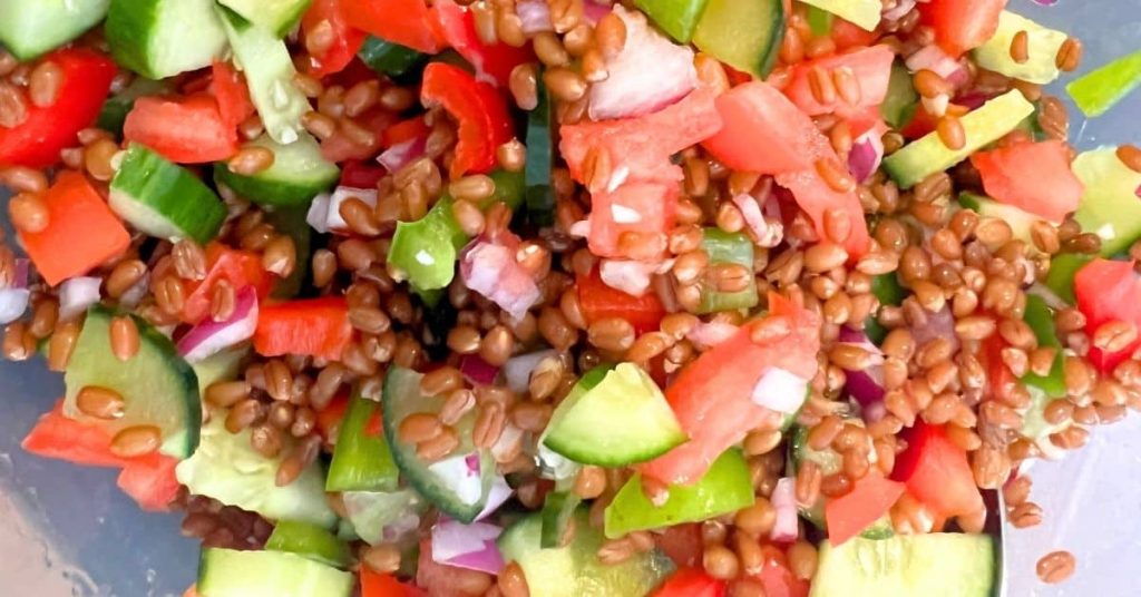 Greek Wheat Berry Salad With Feta and Balsamic Dressing in a bowl